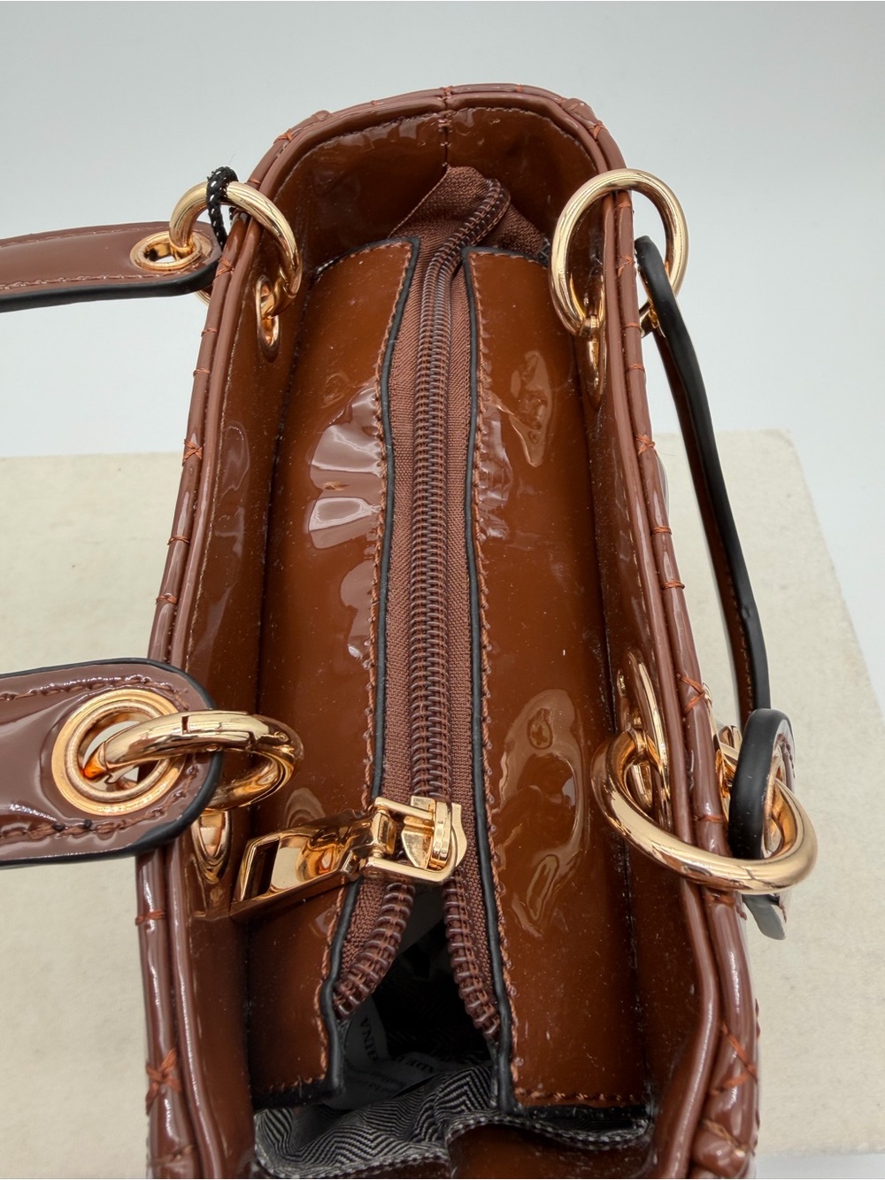 Beautiful, Brown Patent leather mini Bag with Gold Charm - Picture 3 of 15